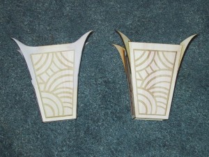 Two mysterio bracers, one with filleting using sculpy