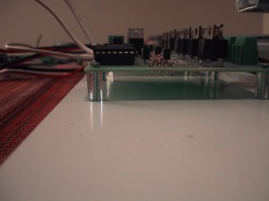 Plastic tubing and sheet metal screws mount the electronics