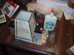 4 panels assembled and being held together by rubber bands