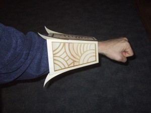 mysterio bracer with hooks on the arm