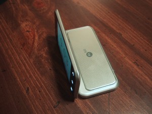 Motorola Backflip phone half-opened in "clock" mode.