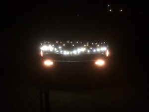 christmas lights on the front of a truck.