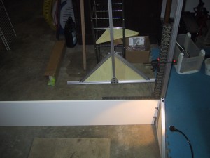 using a carpenters square on the frame