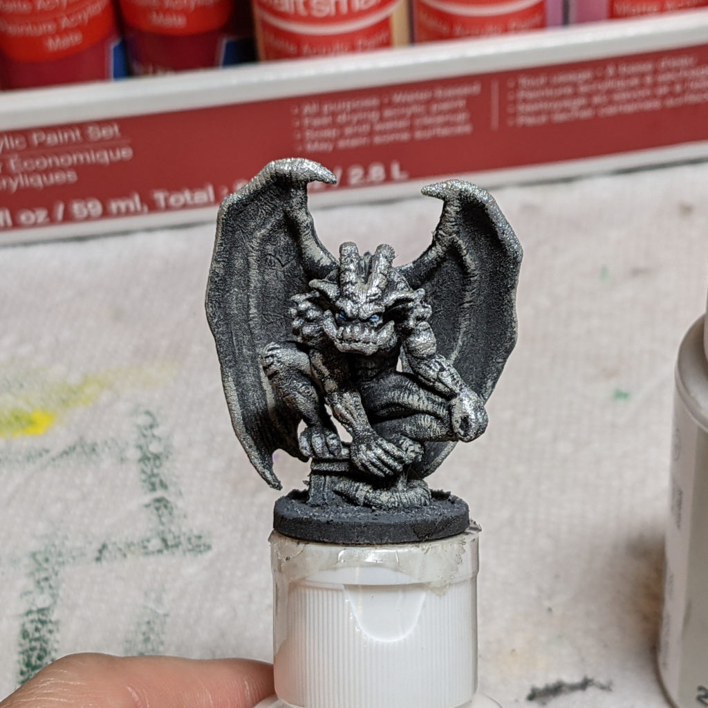 pearlescent white drybrushed on only the highlights