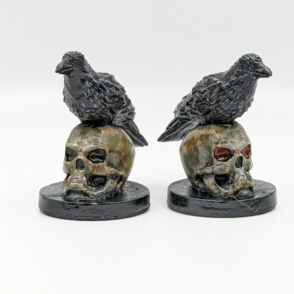 Two ravens on skulls, painting finished.