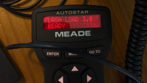 Meade Autostar hand controller displaying the red text: "FLASH LOAD 3.0 READY"